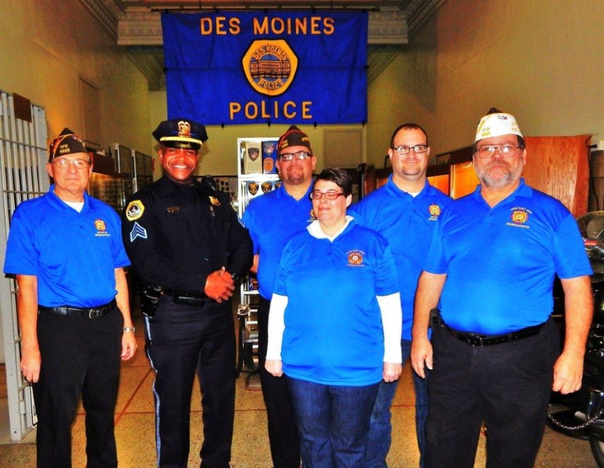 Post members and Auxilary member present at check awarding Kevin DuJth & Dennis Applehous, Kevin Djuth — with Chris McClaskey, Connie Djuth and Robert Forbes at Des Moines Police.